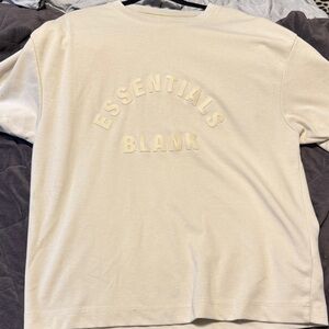 ESSENTIALS Cream 'BLANK' Raised Logo Crewneck